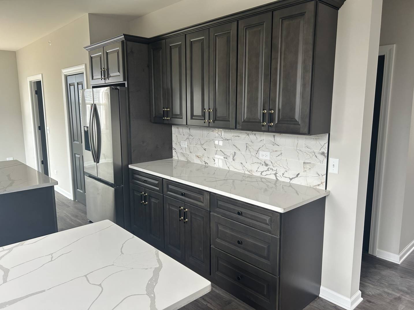 Finished lower-level living space by SHAY Construction